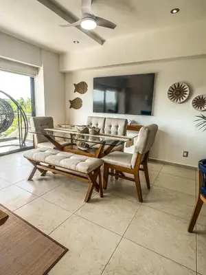 Una televisión o centro de entretenimiento en Acapulco Diamante Departmento Exclusivo