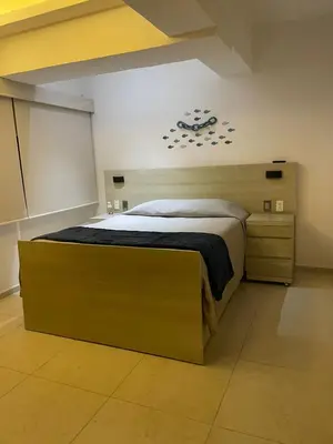 Cama o camas de una habitación en Acapulco Diamante Departmento Exclusivo