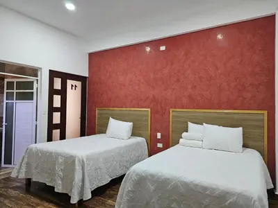 Cama o camas de una habitación en Hotel Familiar Abejac