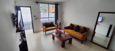 Una televisión o centro de entretenimiento en Apartment with Xochimilco garage