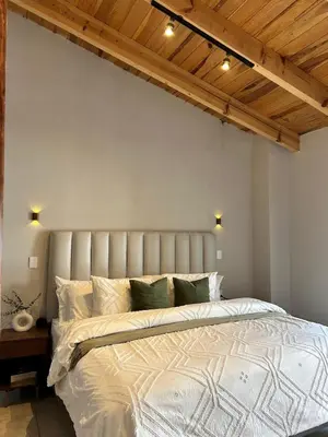 Cama o camas de una habitación en Encanto Taxqueño