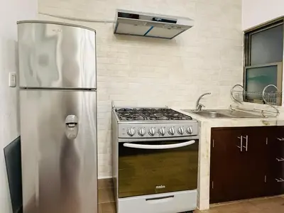 Una cocina o zona de cocina en Ideal Depa Playa y Plazas Cerca