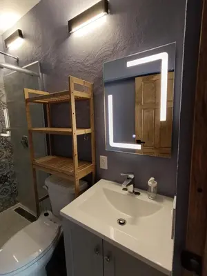 Un baño de El Árbol Plaza Suites - Agua