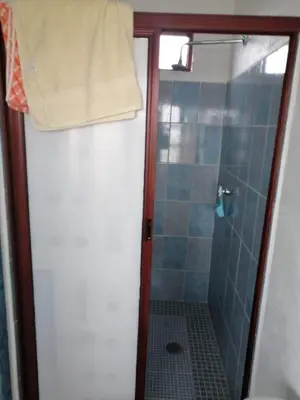 Un baño de Hospedaje gardenias