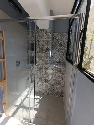 Un baño de El Árbol Plaza Suites - Terra