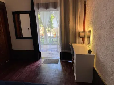 Una televisión o centro de entretenimiento en Hacienda bosque