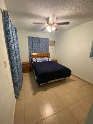 Cama o camas de una habitación en Casa Paz, amplia y cómoda frente a la alberca