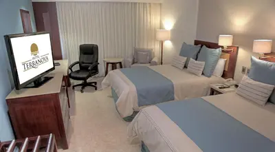 Una televisión o centro de entretenimiento en Hotel Terranova