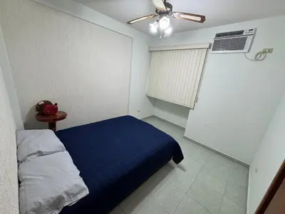 Cama o camas de una habitación en Departamento céntrico en Boca del Rio con alberca