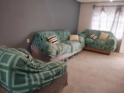 Zona de estar de Family Cutting House