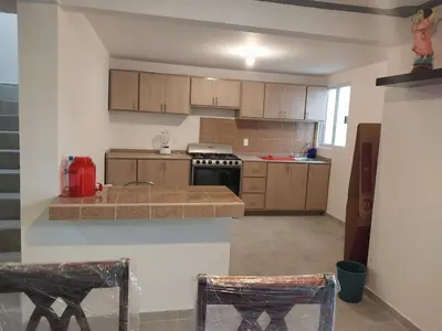 Una cocina o zona de cocina en Family Cutting House