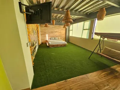 Cama o camas de una habitación en Camping con jacuzzi en la ciudad