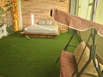 Cama o camas de una habitación en Camping con jacuzzi en la ciudad