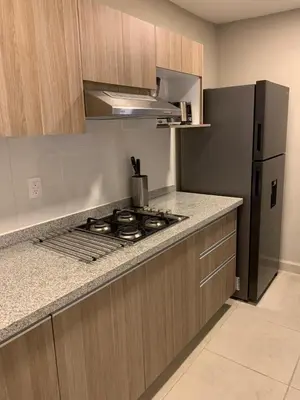 Una cocina o zona de cocina en Departamento dream diamante