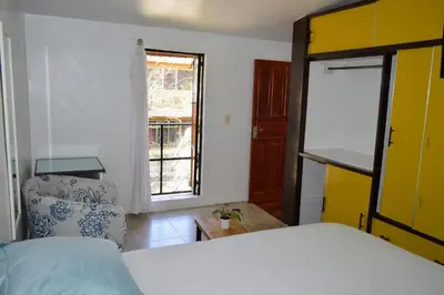 Cama o camas de una habitación en Acogedora Casa con Jardín en Centro de Cd Sahagún
