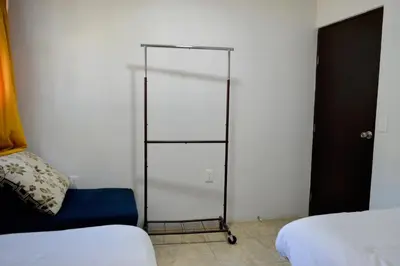 Cama o camas de una habitación en Acogedora Casa con Jardín en Centro de Cd Sahagún