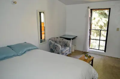 Cama o camas de una habitación en Acogedora Casa con Jardín en Centro de Cd Sahagún