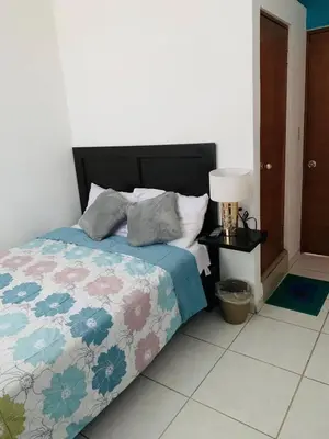 Cama o camas de una habitación en Hotel Pink TH