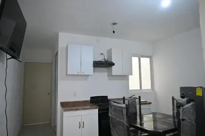 Una cocina o zona de cocina en Departamentos La Soledad