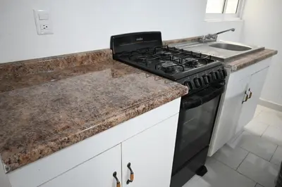 Una cocina o zona de cocina en Departamentos La Soledad
