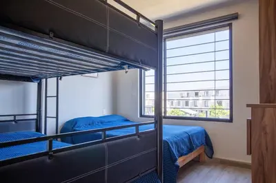 Cama o camas de una habitación en Casa de Relax con Alberca y bellas Amenidades