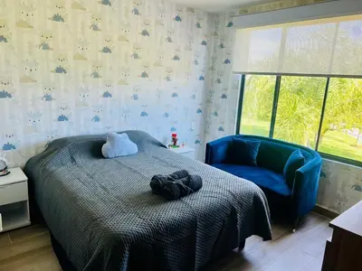 Cama o camas de una habitación en Bellísima casa de lujo con amenidades y alberca