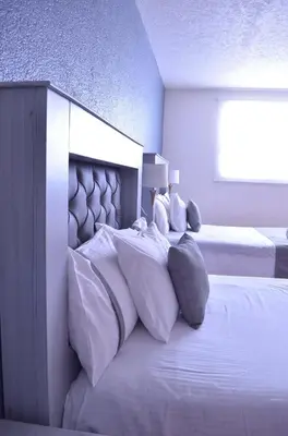 Cama o camas de una habitación en Casa Blue El place ideal for tu descanso