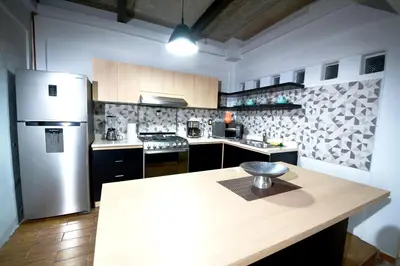 Una cocina o zona de cocina en Departamento Runa, amplio, bonito y acogedor, completo de 2 recámaras y 3 camas matrimoniales