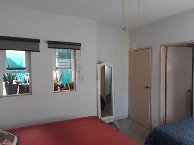 Cama o camas de una habitación en La Noria Barrio