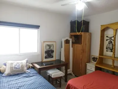 Cama o camas de una habitación en La Noria Barrio