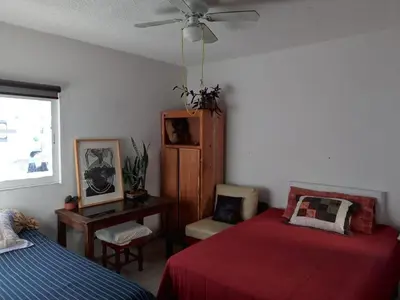 Cama o camas de una habitación en La Noria Barrio