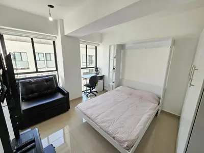 Cama o camas de una habitación en Habitación con baño privado en departamento compartido cerca de zona de conciertos