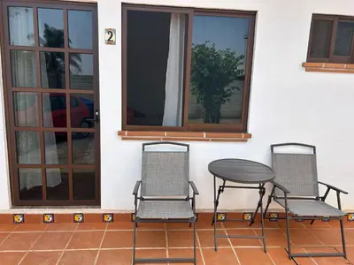 Un balcón o terraza de casa regina