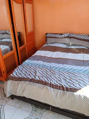Cama o camas de una habitación en Tranquila casa