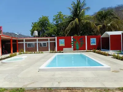 Piscina en o cerca de Cabañas El Amanecer de AYUTA