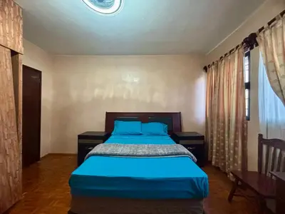 Cama o camas de una habitación en Habitacion Melon