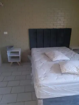Cama o camas de una habitación en Departamento Mamá Rosita