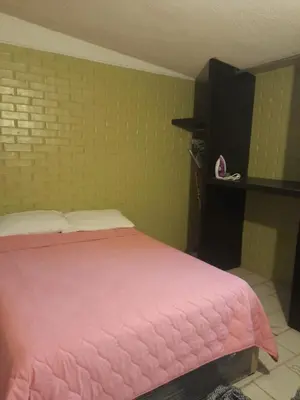 Cama o camas de una habitación en Departamento Mamá Rosita