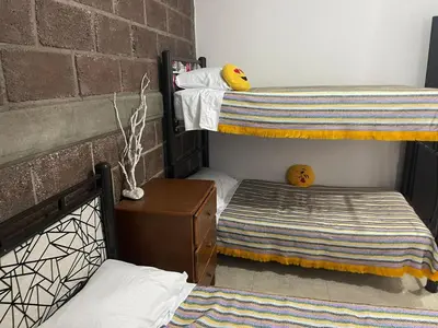 Cama o camas de una habitación en Bonita Quinta Familiar