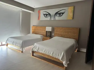 Cama o camas de una habitación en Acapulco Diamante La isla
