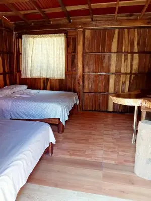 Cama o camas de una habitación en Cabaña la ira