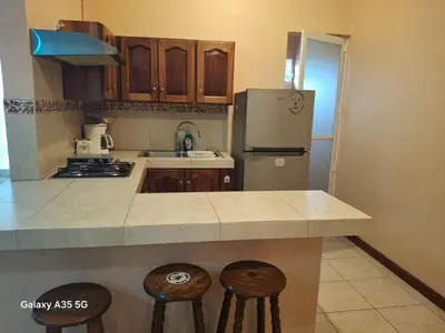 Una cocina o zona de cocina en Sicarú Suites