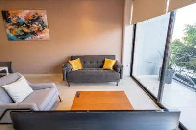 Zona de estar de Terrah Suites Oaxaca