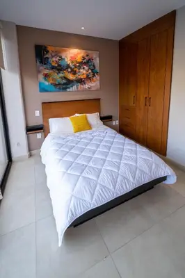 Cama o camas de una habitación en Terrah Suites Oaxaca