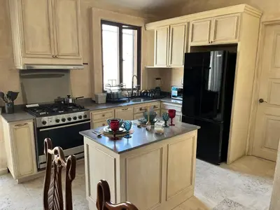 Una cocina o zona de cocina en Val'quirico Auguri Zócalo II, Depto 5 Camas