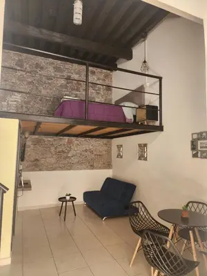 Cama o camas de una habitación en Loft en ciudad de Puebla