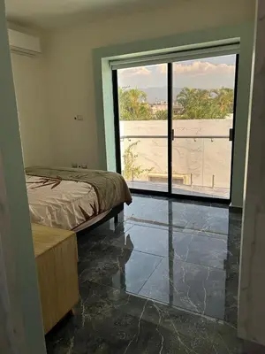 Cama o camas de una habitación en La casa de los abuelos