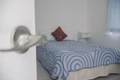 Cama o camas de una habitación en Casa para Bodas a 5min del jardín Checkin flexible