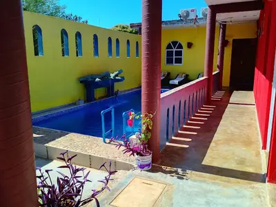 Edificio en el que se encuentra la habitación en casa particular