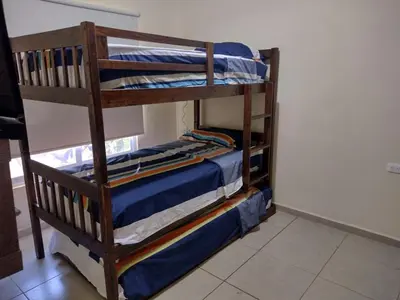 Cama o camas de una habitación en VILLA EN RESIDENCIAL TERRASOL PUNTA DIAMANTEe